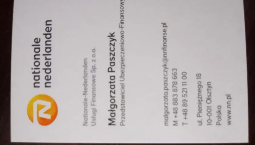 Wizytówka z logo Nationale-Nederlanden i danymi kontaktowymi Małgorzaty Paszczyk.