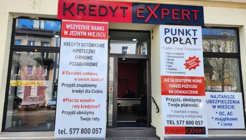 Logo Kredyt Expert z informacjami o kredytach i punktem opłat.